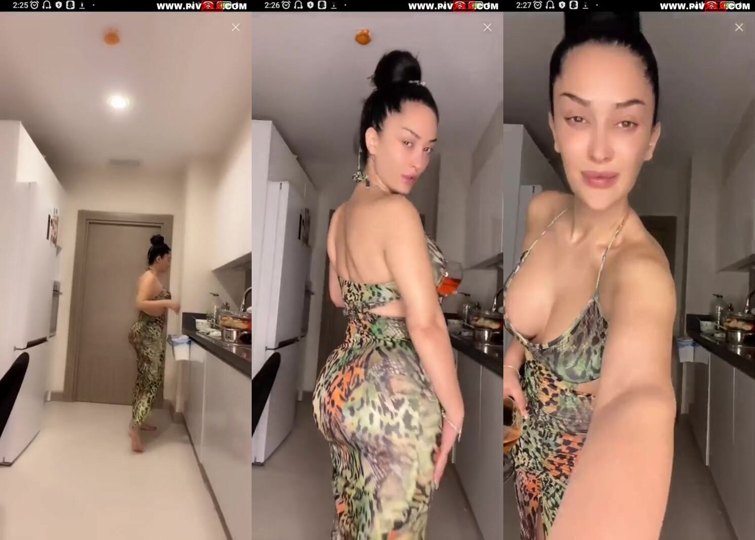 Zemheri tango seksi elbisesiyle mutfakta kalçasını okşayıp içki içiyor İfşa Videoları