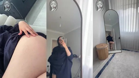 Evli türbanlı eteğini kaldırıp bacaklarını sergiliyor
