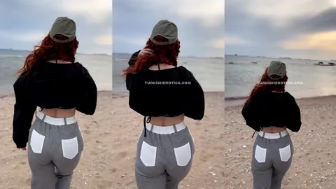 Sahilde Kıvırtarak Yürüyor
